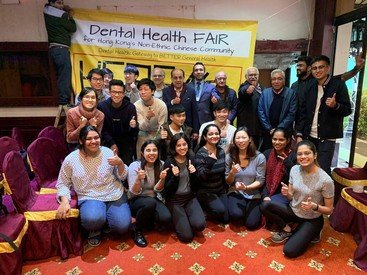 Dr Prasanna Neelakantan (sixth from right in the back row) together with students and NGO volunteers at the Dental Health Fair at India Club in Hong Kong