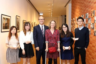 Professor J. Charles Schencking and Dr Janet Borland (third and fourth from left) at the photo exhibition held in April 2017 about the Mitsubishi Young Leaders Tour of Japan, a field trip initiated by Dr Borland for students to explore post-3.11 earthquake and tsunami reconstruction initiatives