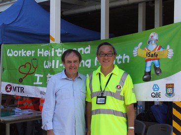 Professor Steve Rowlinson (left) and Mr T.C. Chew, Projects Director of the MTR Corporation, on site together