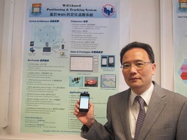 Professor Victor O.K. Li with the location tracking app on an iPhone