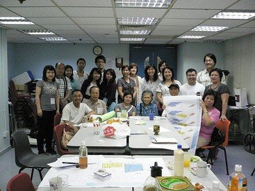 Dr Mirana Szeto (standing back row, 3rd from right) with residents and professional volunteers at the Blue House spatial use participatory planning workshop in September 2009