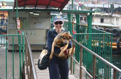 Ms Whitfort with one of Hong Kong’s local dogs adopted from the SPCA